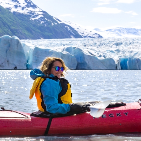 Paddle through the shimmering waters of Alaska’s glacial fjords on a glacier kayaking expedition!