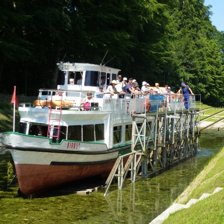 “Sail on grass” through Ostróda Canal, using remarkable system of tracks between picturesque lakes – the only existing in the world.