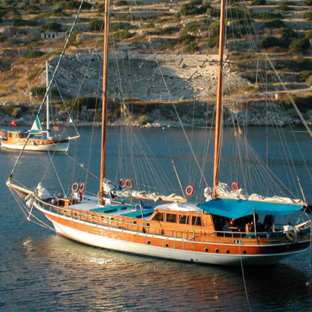 Sailing through the unspoiled bays by private hand-made wooden yachts