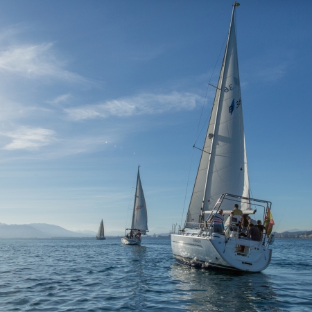 Enjoy the breathtaking nature and crystal-clear waters from a sailing boat or compete in a sailing regatta